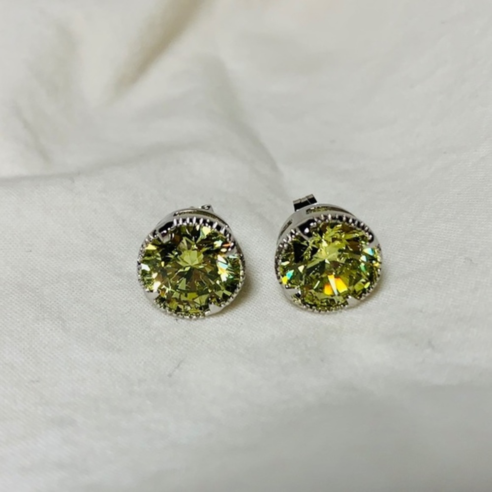 Synthetic peridot in 925 sterling post ear…